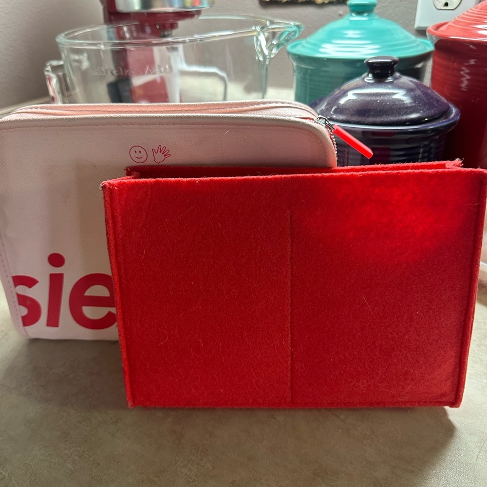 Super cute gently used Glossier bag